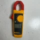 Fluke 323 Yellow 600 Voltage True-RMS Clamp Meter for Accurate Measurements