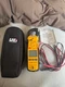 UEI DL579T CLAMP ON MULTIMETER WITH PAPERWORK AND UNOPEN FACTORY ACCESSORIES