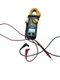 Commercial Electric Clamp Meter w/Temp 600V AC/DC Voltage 600A Used .