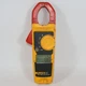 Fluke 323 True RMS Clamp Meter ROUGH SHAPE POWERS ON FOR PARTS OR REPAIR
